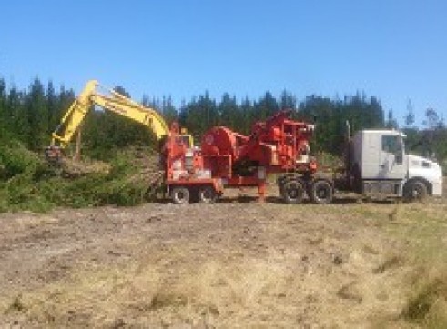 Truck mounted whole tree chipping machine